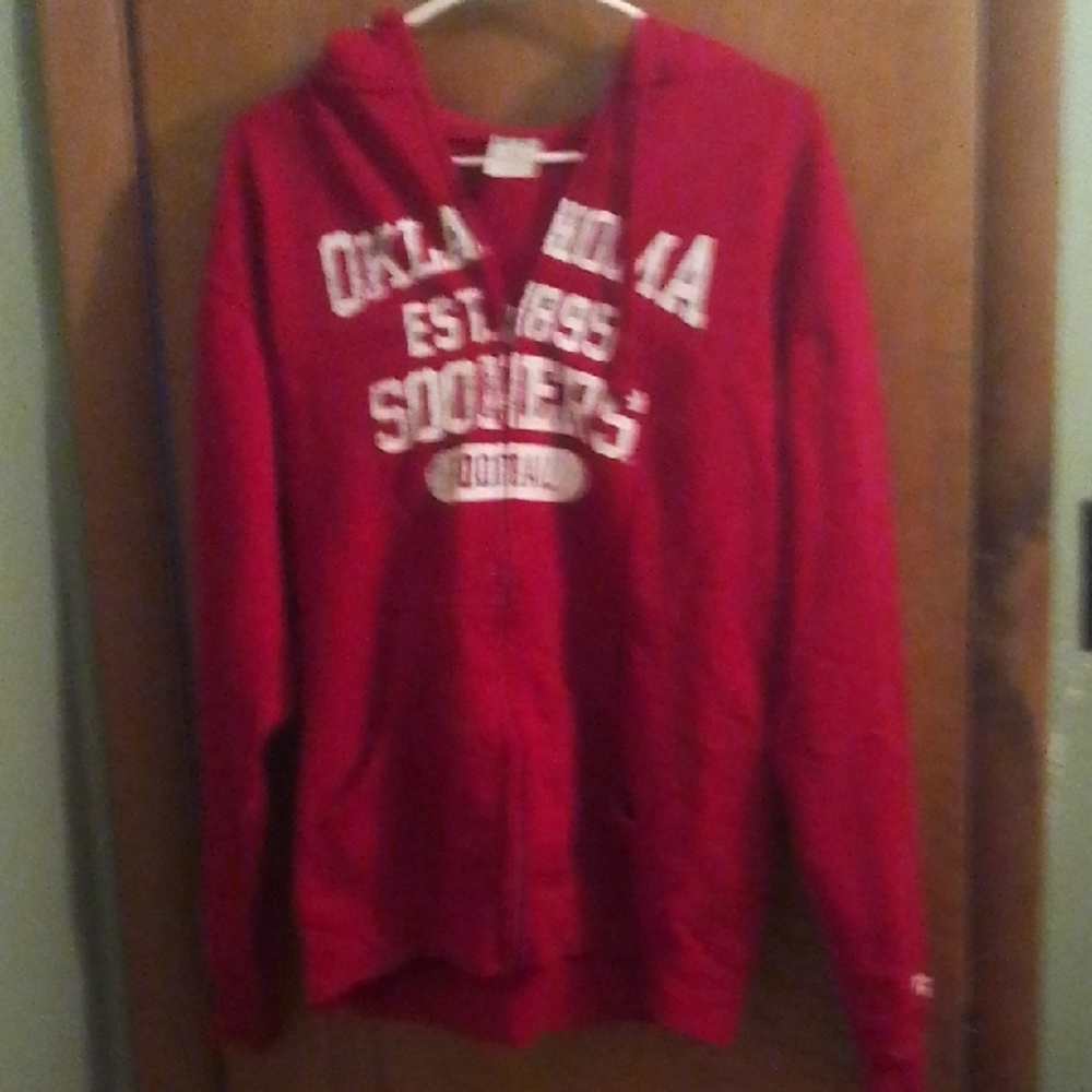 Oklahoma Sooners Red Hooded Zip Up Jacket Russel is the brand size medium 36-40